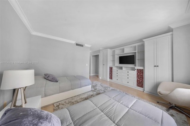 9801 Collins Ave Unit 5S, Bal Harbour, FL 33154 - bedroom with ornamental molding, wood finished floors, and baseboards