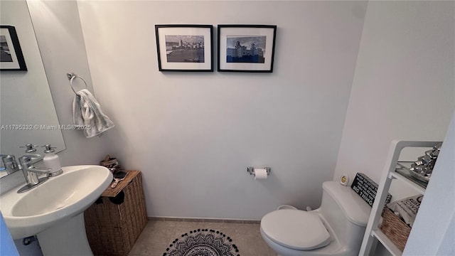 60 SW 13th St Unit 2402, Miami, FL 33130 - half bathroom with toilet, tile patterned flooring, and a sink