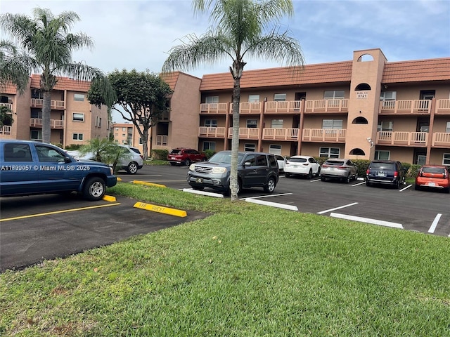 2791 N Pine Island Rd Unit 301, Sunrise, FL 33322 - view of apartment building / complex featuring uncovered parking