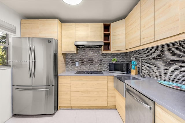 1840 Jefferson Ave Unit 103, Miami Beach, FL 33139 - kitchen with black appliances, light brown cabinetry, tasteful backsplash, open shelves, and extractor fan
