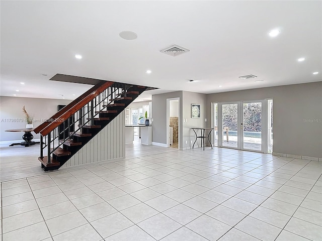 10227 SW 53rd Ct, Cooper City, FL 33328 - unfurnished living room with french doors, recessed lighting, stairway, light tile patterned floors, and baseboards
