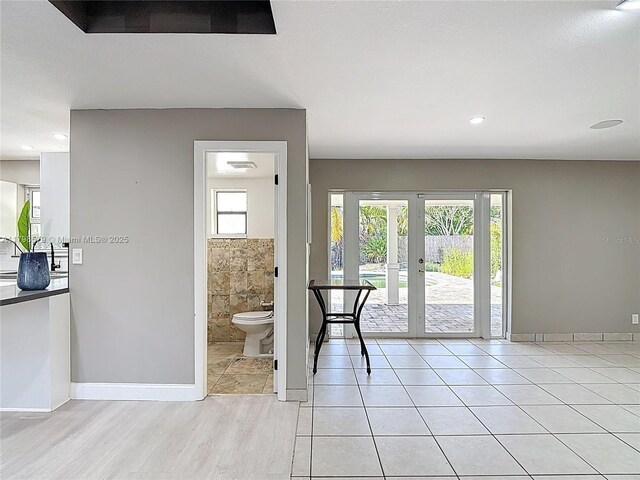 10227 SW 53rd Ct, Cooper City, FL 33328 - foyer featuring french doors, plenty of natural light, baseboards, and recessed lighting