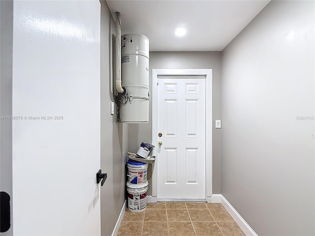 10227 SW 53rd Ct, Cooper City, FL 33328 - doorway with baseboards and light tile patterned flooring