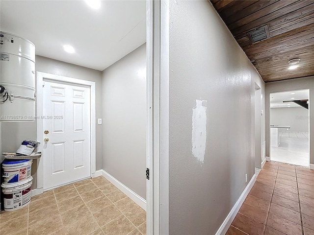 10227 SW 53rd Ct, Cooper City, FL 33328 - corridor featuring baseboards, wooden ceiling, and light tile patterned floors