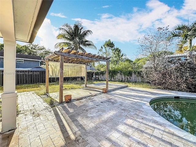 10227 SW 53rd Ct, Cooper City, FL 33328 - view of patio / terrace with a pergola, a fenced backyard, and a pool