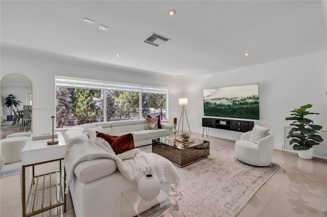 615 NE 115th St, Biscayne Park, FL 33161 - living room with ornamental molding, recessed lighting, baseboards, and arched walkways