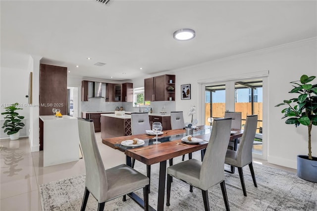 615 NE 115th St, Biscayne Park, FL 33161 - dining room featuring baseboards, crown molding, and recessed lighting