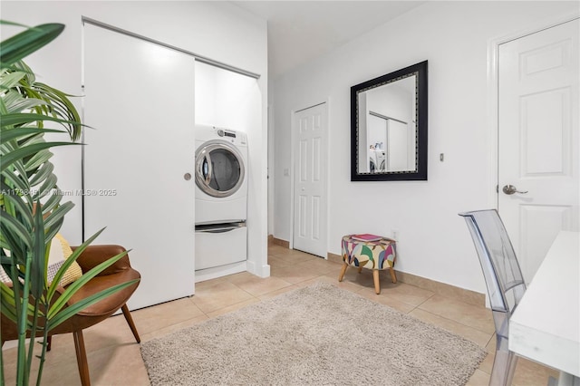 615 NE 115th St, Biscayne Park, FL 33161 - laundry area with washer / dryer, light tile patterned flooring, and baseboards