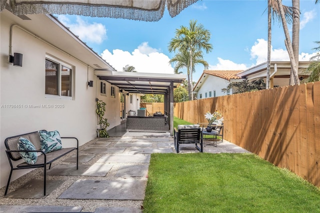 615 NE 115th St, Biscayne Park, FL 33161 - view of patio featuring an outdoor living space