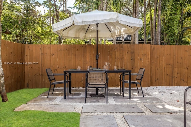 615 NE 115th St, Biscayne Park, FL 33161 - view of patio / terrace featuring fence