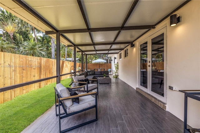 615 NE 115th St, Biscayne Park, FL 33161 - view of patio / terrace featuring a fenced backyard, french doors, and an outdoor living space