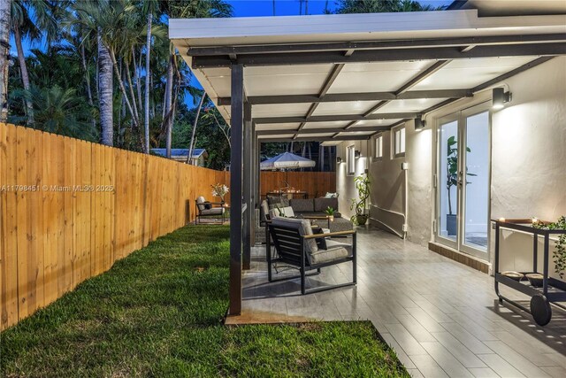 615 NE 115th St, Biscayne Park, FL 33161 - view of patio featuring a fenced backyard