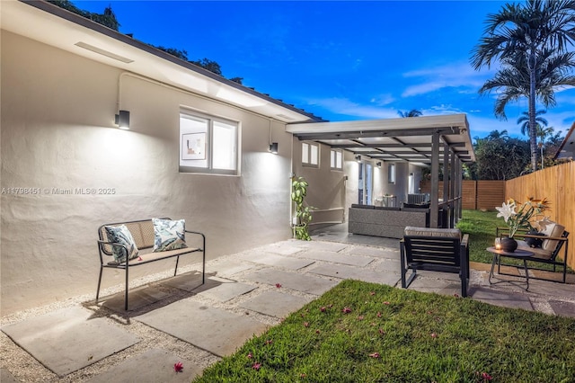 615 NE 115th St, Biscayne Park, FL 33161 - view of patio / terrace with an outdoor hangout area and a fenced backyard