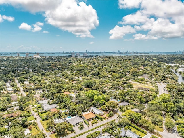 615 NE 115th St, Biscayne Park, FL 33161 - view of urban area with a large body of water and a tree filled landscape