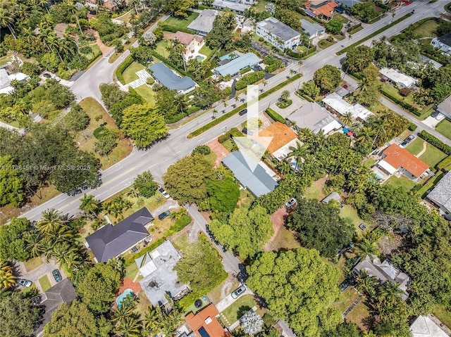615 NE 115th St, Biscayne Park, FL 33161 - aerial view of property and surrounding area featuring nearby suburban area