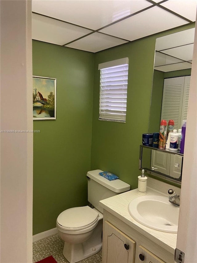9581 Sunrise Lakes Blvd Unit 202, Sunrise, FL 33322 - bathroom featuring vanity, toilet, and baseboards