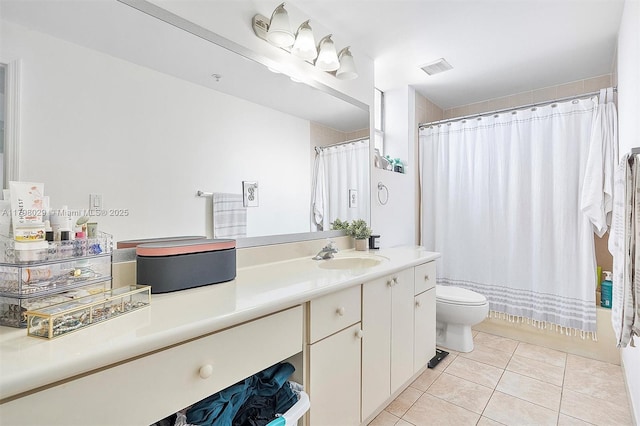 full bath with tile patterned floors, toilet, and vanity