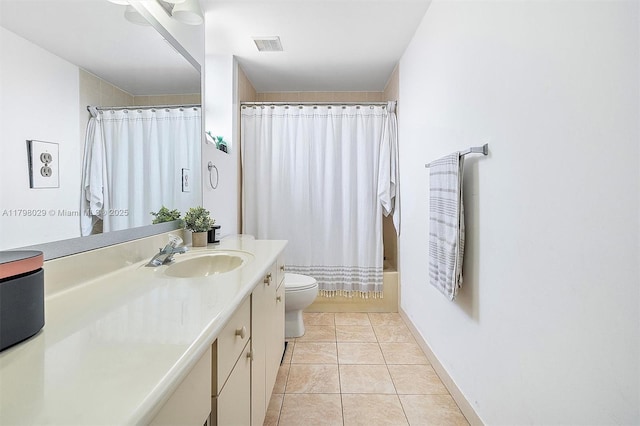 full bathroom featuring toilet, vanity, shower / tub combo with curtain, and tile patterned floors