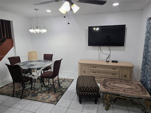 dining area with ceiling fan, recessed lighting, baseboards, a chandelier, and light tile patterned floors