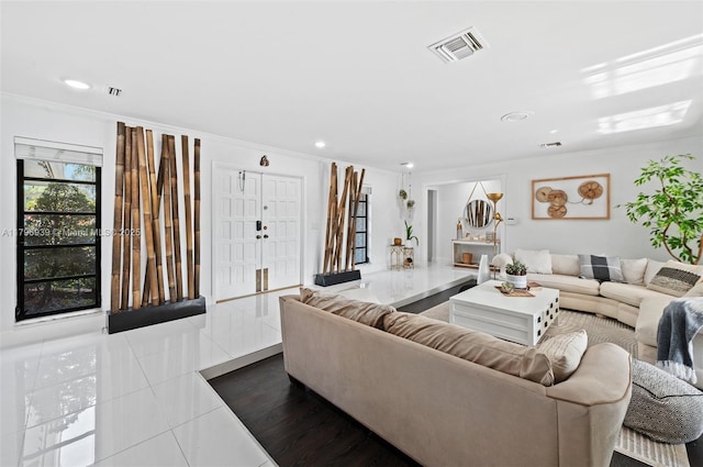 3215 NW 114th Ln, Coral Springs, FL 33065 - living area with dark tile patterned floors, crown molding, and recessed lighting