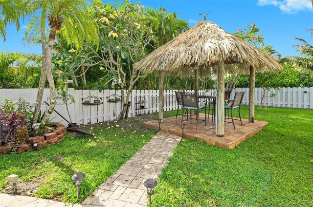 3215 NW 114th Ln, Coral Springs, FL 33065 - view of yard with a patio area