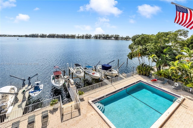 2201 Brickell Ave Unit 77, Miami, FL 33129 - community pool with boat lift, a water view, and a boat dock