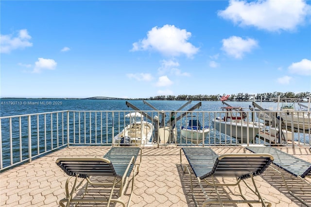 2201 Brickell Ave Unit 77, Miami, FL 33129 - view of patio featuring a water view and a balcony