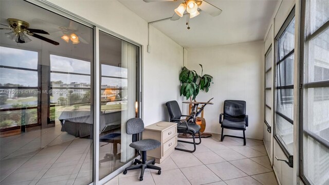 3087 Newport S Unit 3087, Deerfield Beach, FL 33442 - sunroom / solarium with a ceiling fan, plenty of natural light, and tile patterned flooring