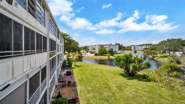 3087 Newport S Unit 3087, Deerfield Beach, FL 33442 - view of grassy yard featuring a water view