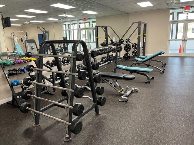 3087 Newport S Unit 3087, Deerfield Beach, FL 33442 - workout area with a drop ceiling and baseboards