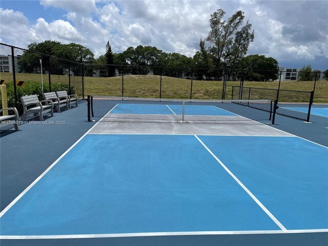 3087 Newport S Unit 3087, Deerfield Beach, FL 33442 - view of tennis court with fence