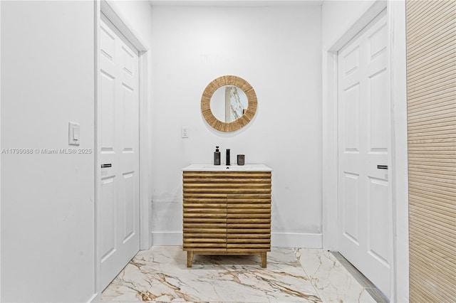 1824 NW 47th St, Miami, FL 33142 - bathroom with marble finish floors, vanity, and baseboards