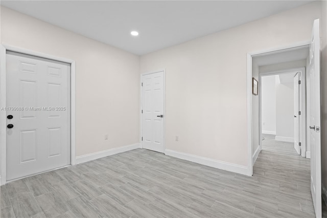 1824 NW 47th St, Miami, FL 33142 - empty room featuring baseboards, light wood-style flooring, and recessed lighting