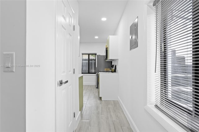 1824 NW 47th St, Miami, FL 33142 - hallway featuring baseboards, electric panel, and recessed lighting