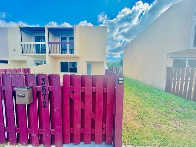 3672 SW 59th Ave Unit 7, Davie, FL 33314 - gate featuring fence
