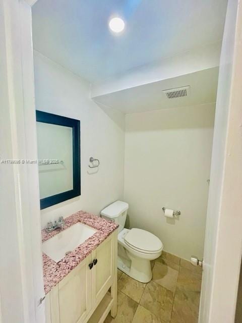3672 SW 59th Ave Unit 7, Davie, FL 33314 - bathroom featuring toilet and vanity