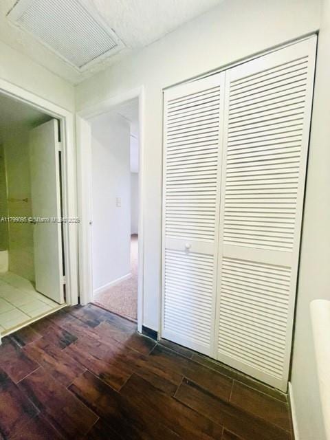 3672 SW 59th Ave Unit 7, Davie, FL 33314 - hall featuring dark wood finished floors and baseboards