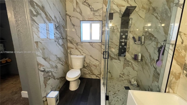 full bathroom featuring a marble finish shower and toilet