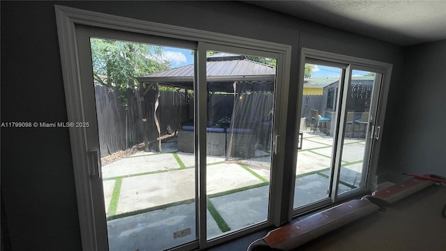 doorway to outside with healthy amount of natural light