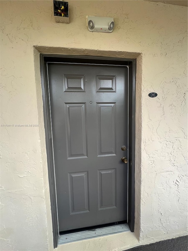 14500 SW 88th Ave Unit 245, Palmetto Bay, FL 33176 - entrance to property with stucco siding