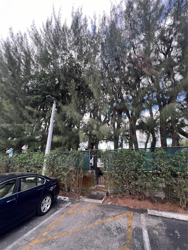 14500 SW 88th Ave Unit 245, Palmetto Bay, FL 33176 - view of front of property featuring uncovered parking