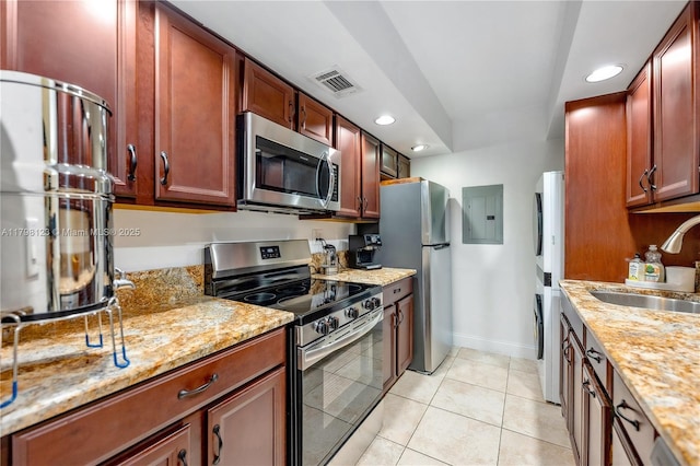 9456 SW 77th Ave Unit T6, Miami, FL 33156 - kitchen featuring stainless steel appliances, electric panel, recessed lighting, light tile patterned flooring, and light stone countertops