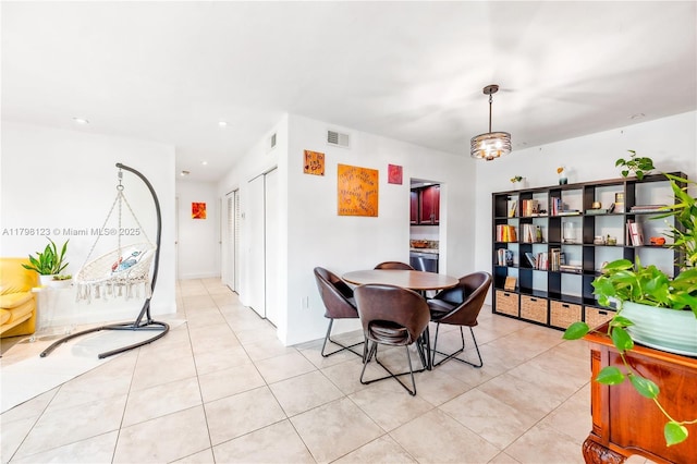 9456 SW 77th Ave Unit T6, Miami, FL 33156 - dining area with light tile patterned floors, a chandelier, and recessed lighting