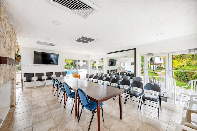 9456 SW 77th Ave Unit T6, Miami, FL 33156 - dining area with light tile patterned flooring and french doors