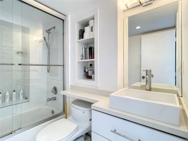 555 NE 15th St Unit 502, Miami, FL 33132 - full bathroom featuring toilet, shower / bath combination with glass door, vanity, and recessed lighting