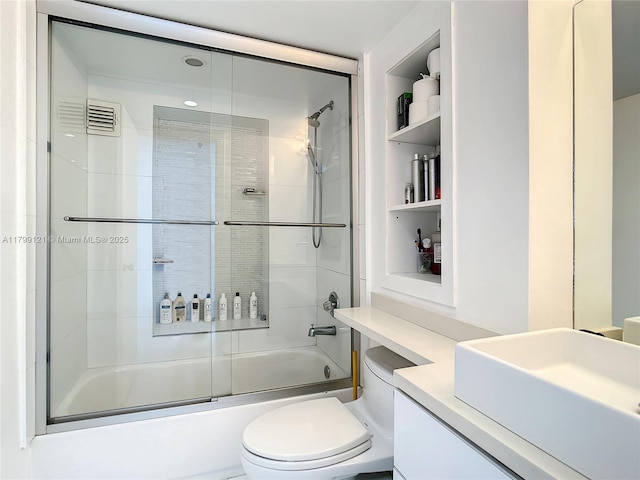 555 NE 15th St Unit 502, Miami, FL 33132 - full bath featuring toilet, enclosed tub / shower combo, and vanity