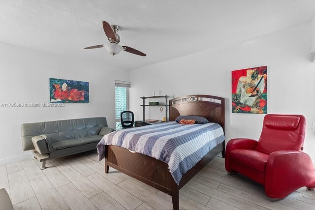 5715 Bayberry Ln, Tamarac, FL 33319 - bedroom featuring wood finished floors and a ceiling fan