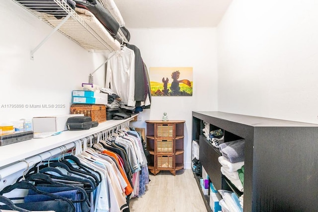 5715 Bayberry Ln, Tamarac, FL 33319 - spacious closet featuring wood finished floors