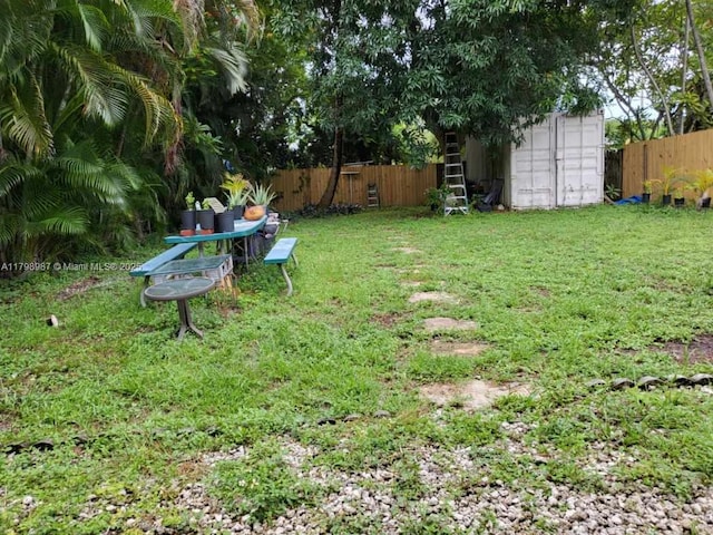 2415 Garfield St, Hollywood, FL 33020 - view of yard featuring a storage shed and an outdoor structure