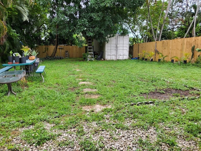 2415 Garfield St, Hollywood, FL 33020 - view of yard featuring a storage shed and an outdoor structure